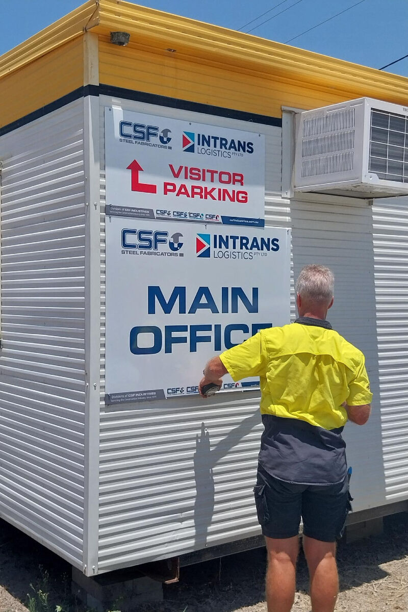 Steve Installing New Signage CSF Industries